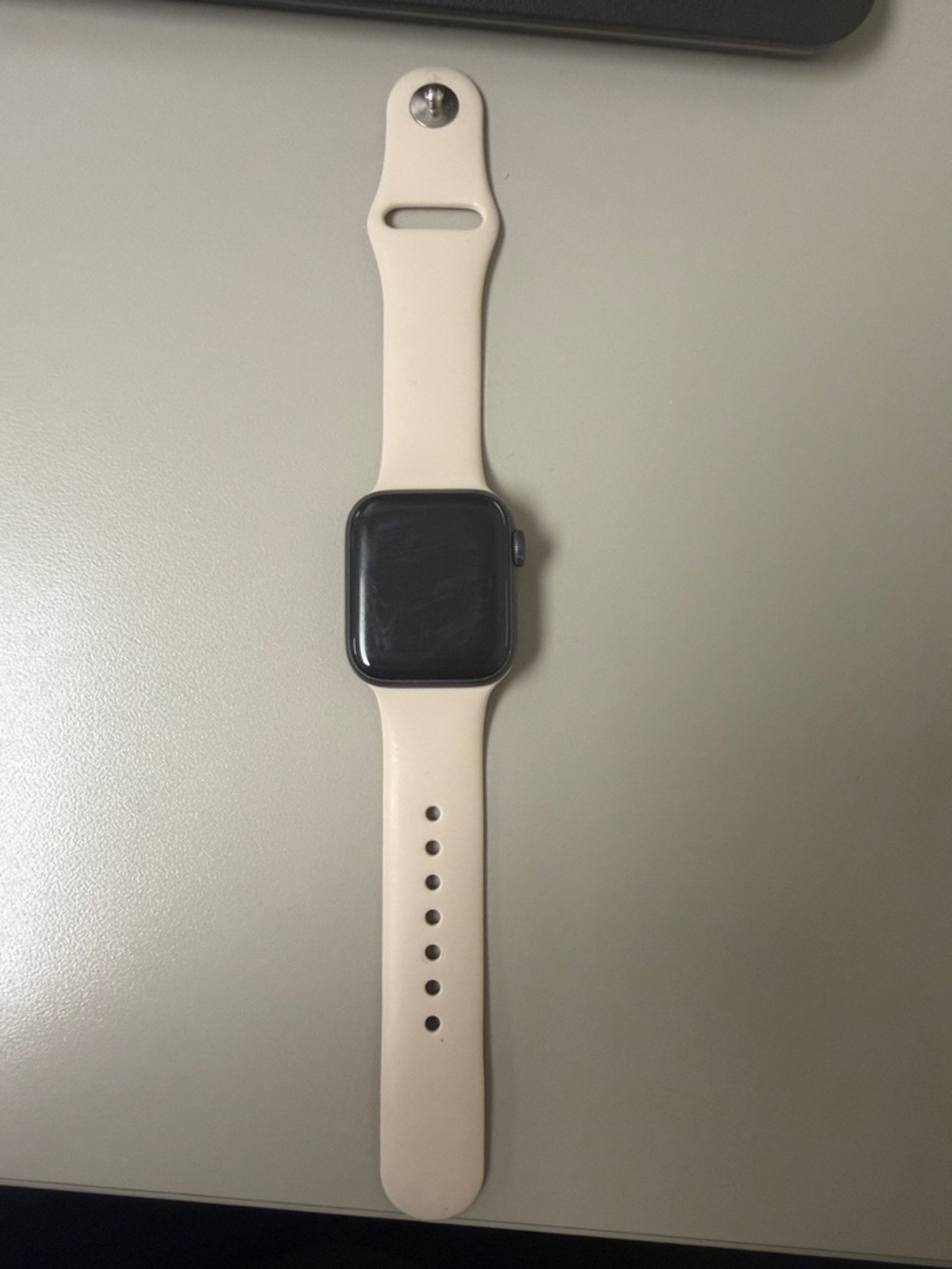 Apple Watch with Pink Sand Sport Band and Space Gray Case